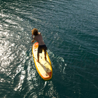 Thumbnail for Back View of a man on a Aqua Marina Fusion 10'10