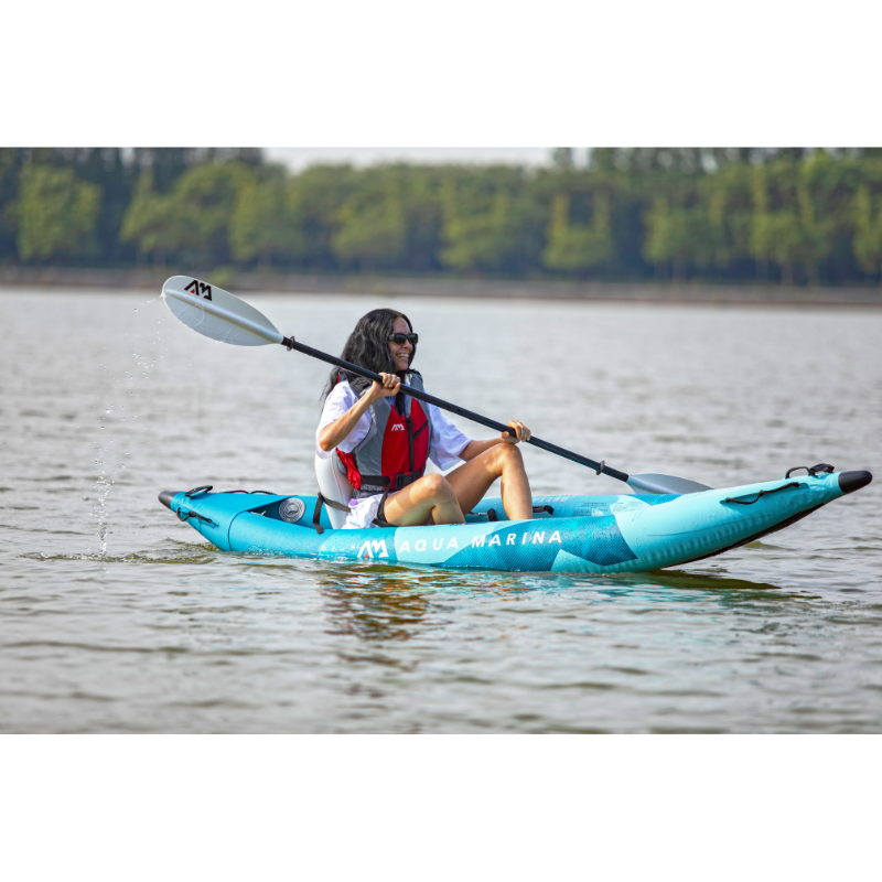 A person riding a BETTA-312 Recreational Inflatable Kayak (2026) | 1-Person