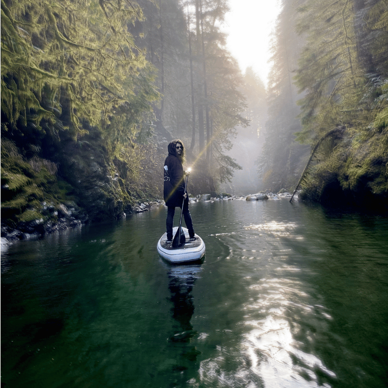 Lifestyle Photo of a man on a Quoth 11' White Byrne 2026 Inflatable Paddle Board SUP