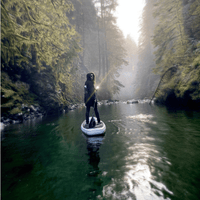 Thumbnail for Lifestyle Photo of a man on a Quoth 11' White Byrne 2026 Inflatable Paddle Board SUP