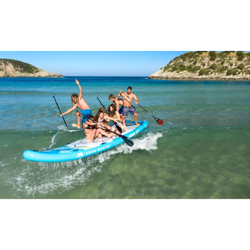 People having fun on a Aqua Marina 18'1" Mega Inflatable Paddle Board SUP