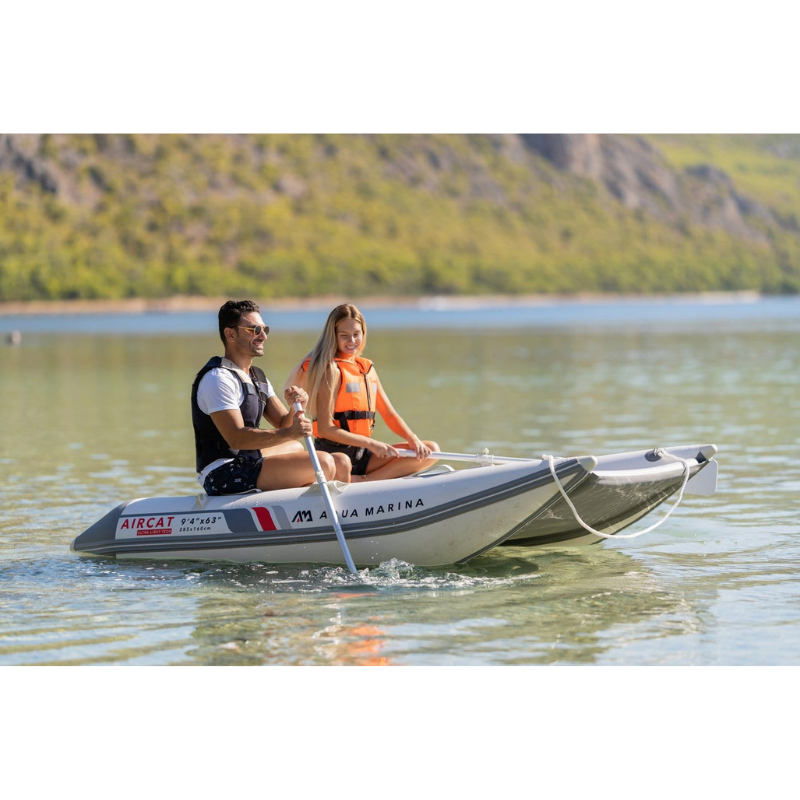 Two People on Aqua Marina 9'4" x 63″ AIRCAT 2021/2022 Inflatable Catamaran Boat