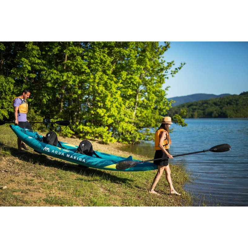 two person carrying Aqua Marina 13’6″ STEAM-412 2-Person Inflatable Kayak